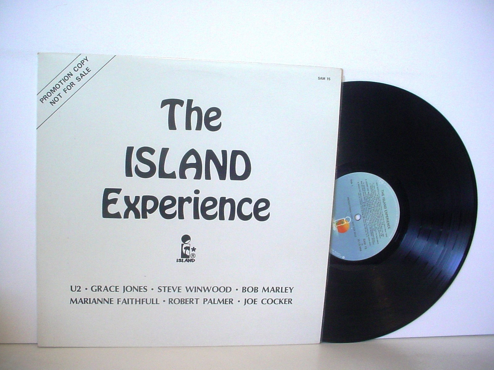 THE ISLAND EXPERIENCE PROMO 1983 ISLAND SAM 15 U2 Bob Marley Grace Jones A